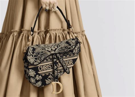 wearing dior saddle bag|dior saddle bag cost.